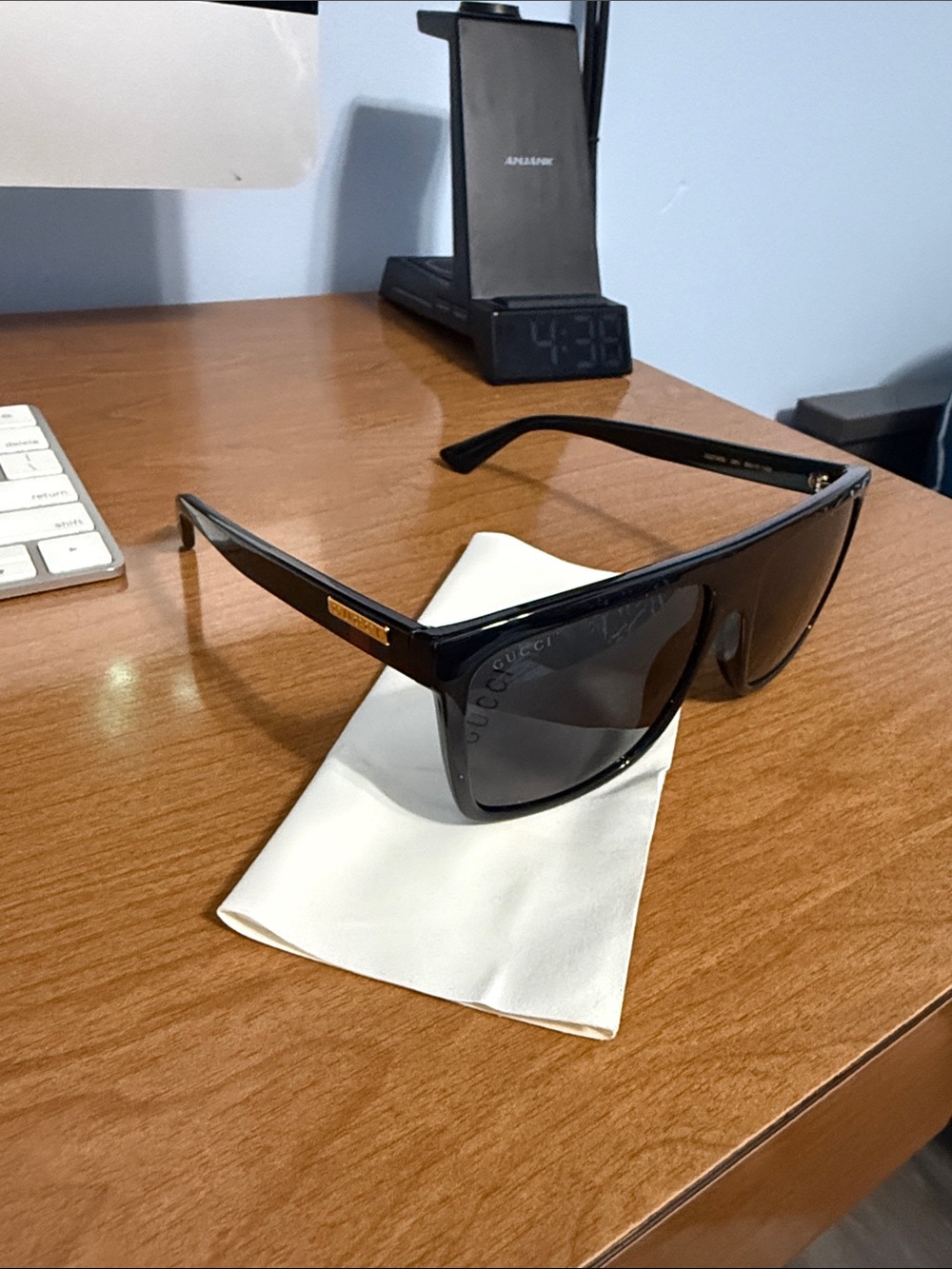 Gucci Black Sunglasses with Gold Plaque